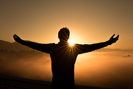 silhouette of man during sunrise thumbnail