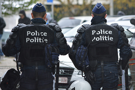 two men wearing black Police motorcycle gears thumbnail