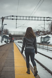 woman walking on train station thumbnail