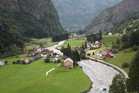 aerial photo of houses near mountain thumbnail