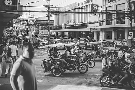 Grayscale Photo of Motorcycles and People thumbnail