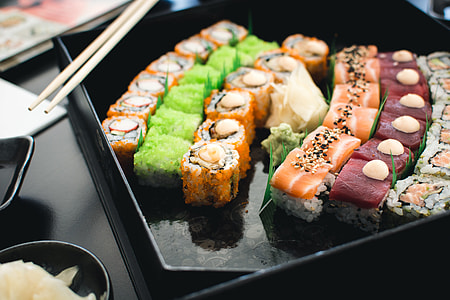 Colorful sushi in a black box thumbnail