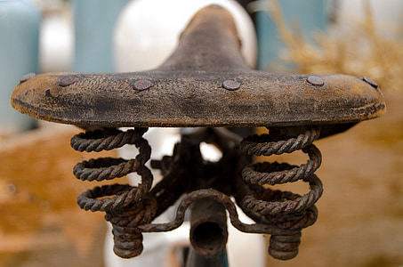 brown and black bicycle saddle thumbnail
