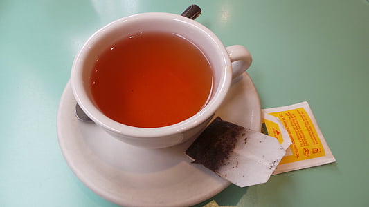 white ceramic teapot on saucer thumbnail