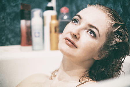 woman sitting on bathtub thumbnail