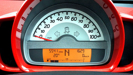 Red and Black Car Speedometer at Neutral thumbnail