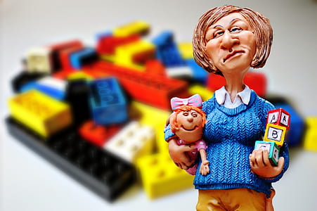 ceramic woman figurine in shallow-focus shot thumbnail