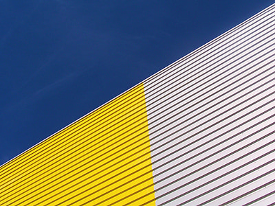white and yellow building thumbnail