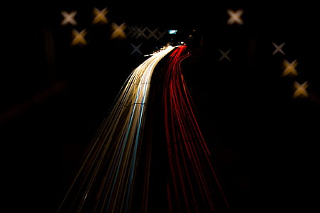 timelapse photography of cars on road thumbnail