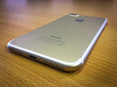 gold iPhone 7 Plus on table thumbnail