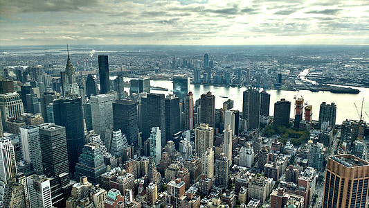 skyscrapers under cloudy sky thumbnail