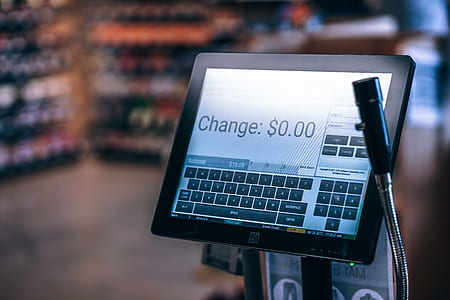 black flat screen cash register monitor displaying at change 0.00 dollars thumbnail