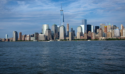 city buildings under cloudy sky thumbnail
