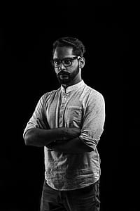 grayscale photography of man wearing dot print sport shirt thumbnail