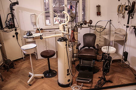 vintage brown and white dentist chair thumbnail