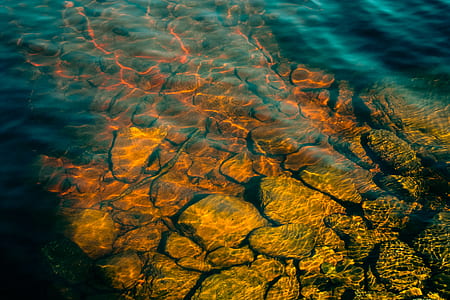 brown rocks underwater thumbnail