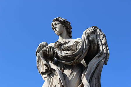 woman holding cloth sculpture thumbnail