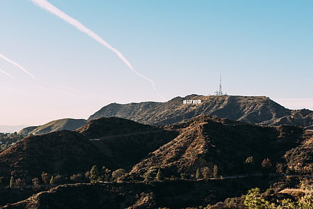 mountains near trees during daytime thumbnail