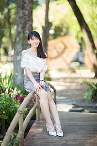 woman sitting on rails thumbnail