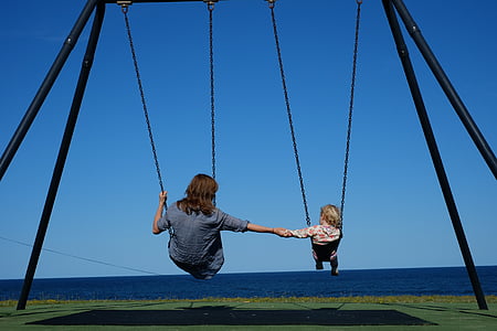 woman sitting on swing thumbnail