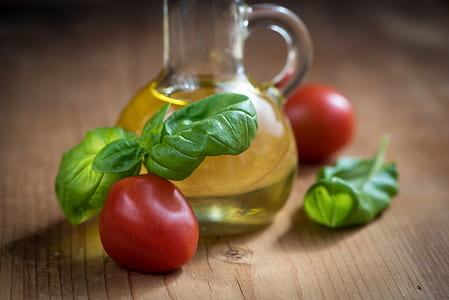 red cherry tomatoes and green basin leaves thumbnail