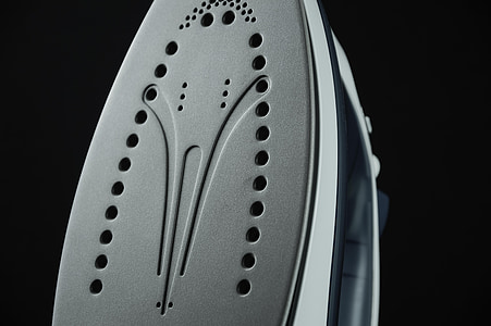 closeup of white clothes iron thumbnail