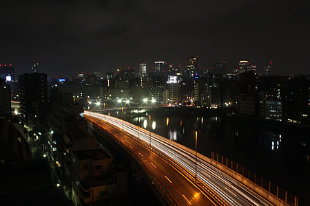 time lapse photography of road at nighttime thumbnail