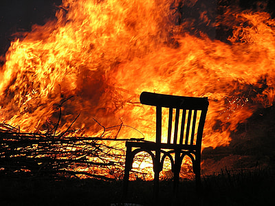 photo of chair near burning trees thumbnail