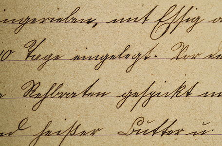 brown lined paper with text in closeup photography thumbnail