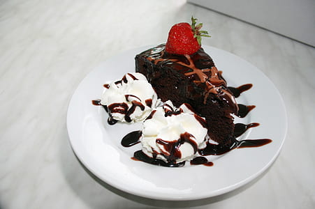 sliced cake with strawberry on top thumbnail