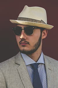 man wears gray and black dress suit thumbnail