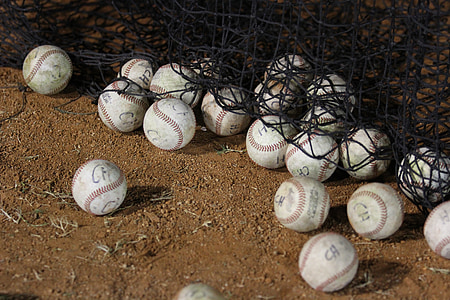 bunch of baseballs on ground thumbnail