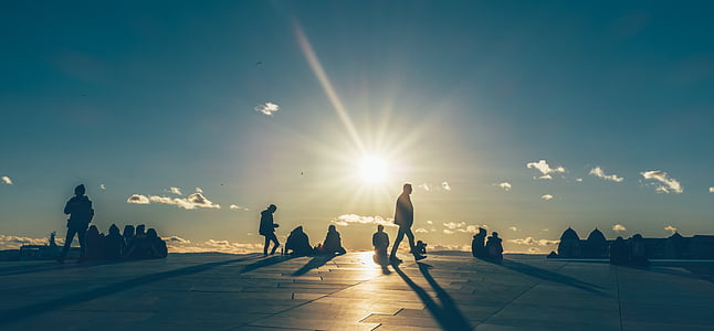 silhouette of people sitting and walking thumbnail