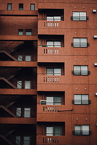 brown building photo at daytime thumbnail