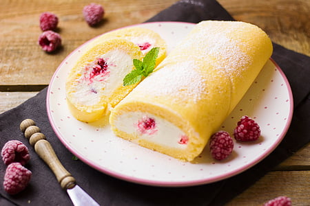 round white and pink ceramic plate with yellow bread thumbnail