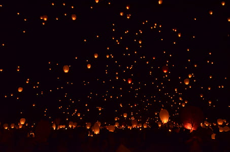 low-angle photography of balloon candle lot thumbnail