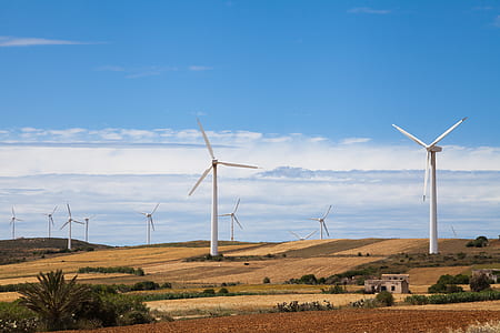 Windmill under white and blue sky thumbnail