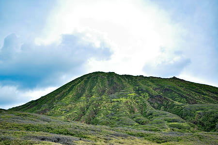 Green Mountain Under White Cloudy Sky thumbnail