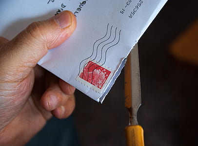 person holding envelope card thumbnail