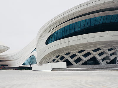 landscape photography of white concrete building thumbnail
