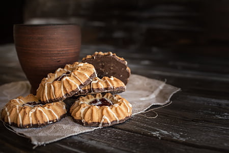 five cookies with brown wooden cup thumbnail