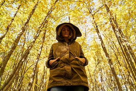 woman standing on forest thumbnail