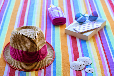 Towel, hat and sunglasses thumbnail