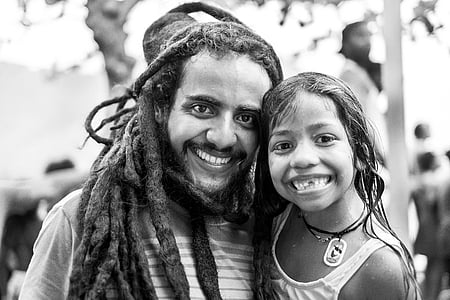 grayscale photography of man and girl thumbnail