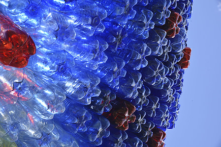 blue-and-red plastic bottles at daytime thumbnail