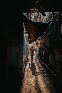 man walking on alley thumbnail