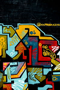 photo of blue, brown, and red graffiti art thumbnail