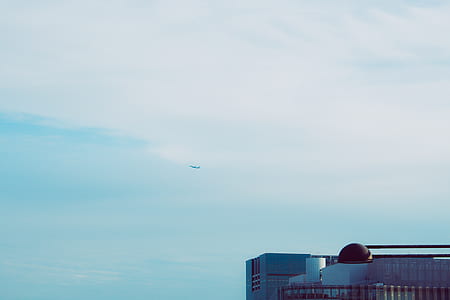 Plane Flying on Blue Sky thumbnail