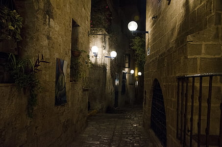 lighted wall lamps on hallway thumbnail