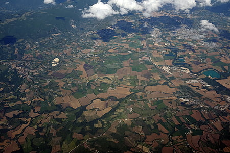 aerial photography of green and brown fields thumbnail